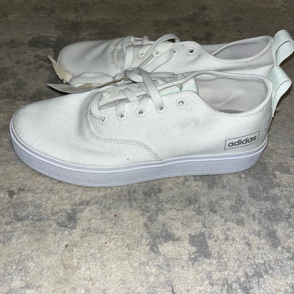 white adidas tennis shoes